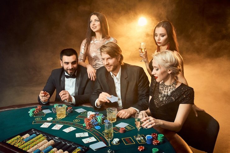Layout meja baccarat dengan taruhan Banker, Player, Tie